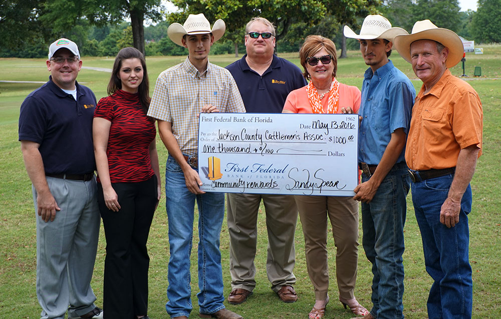 Members of the Jackson County Cattlemens Association stand together after receiving their check through First Federal's Community Rewards Program.